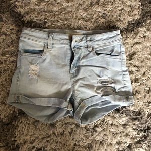 distressed light wash shorts